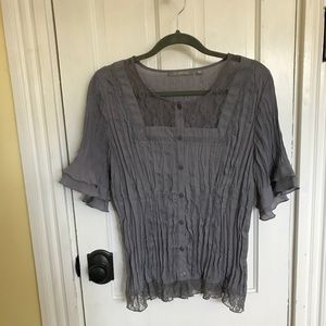 Grey blouse, feminine, lace embellishments.
